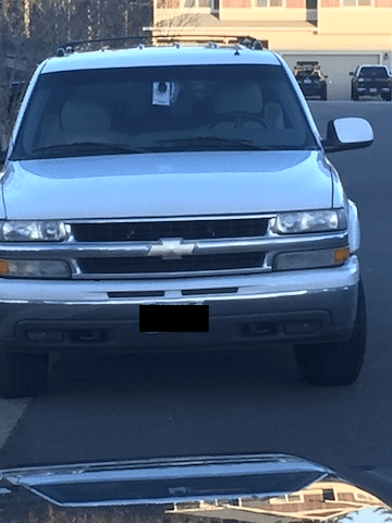 This is the white Suburban that parked outside Kimberly's house on February 7. Photo from Kimberly Rew.